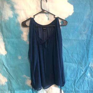 Long sleeve sheer top with openings on the sleeves